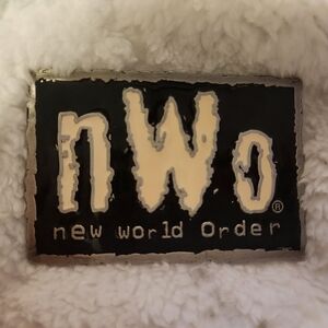 Vintage 1998 World Championship Wrestling (WCW) New World Order pewter buckle